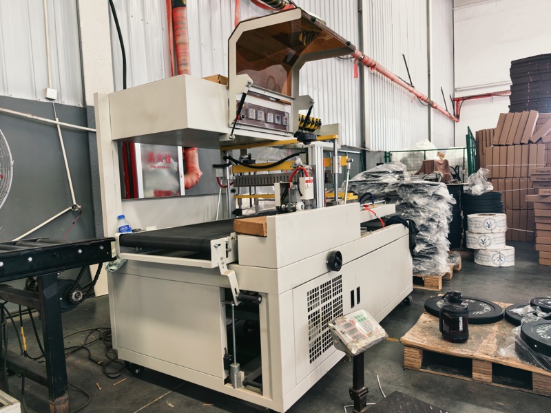 Yunlingyu factory packing line with gym equipment cartons and bumper plates